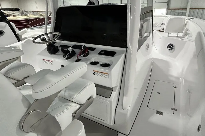 Slide: The Image of 2026 Sportsman Heritage 321 Center Console boat interior sink and countertop detail. - 33