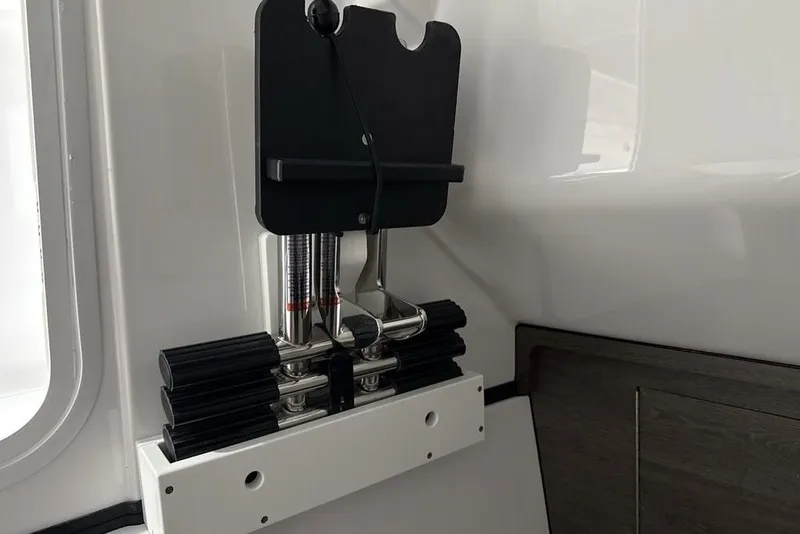 Slide: The Image of 2026 Sportsman Heritage 321 Center Console interior detail with mounted equipment. - 43