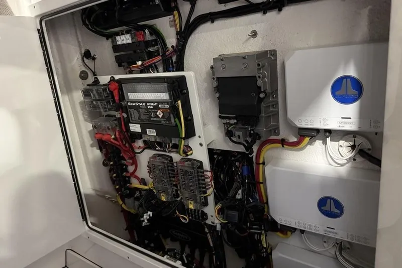 Slide: The Image of Electrical system inside 2026 Sportsman Heritage 321 Center Console boat, showcasing wiring and components. - 45