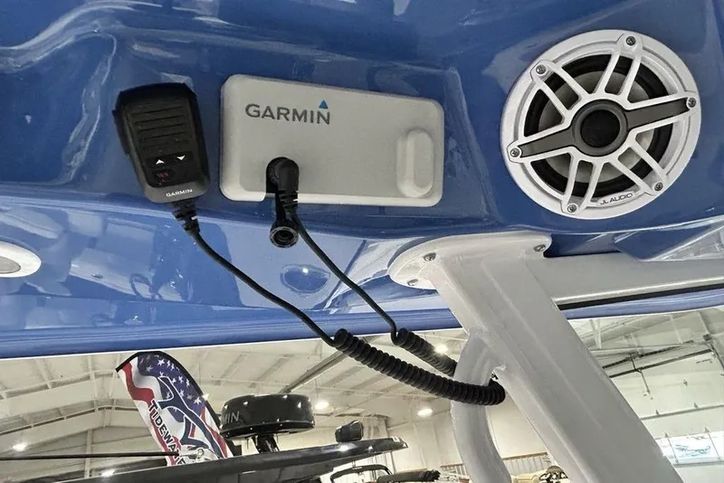 Slide: The Image of Garmin and JL Audio equipment on 2026 Sportsman Heritage 321 Center Console boat. - 55