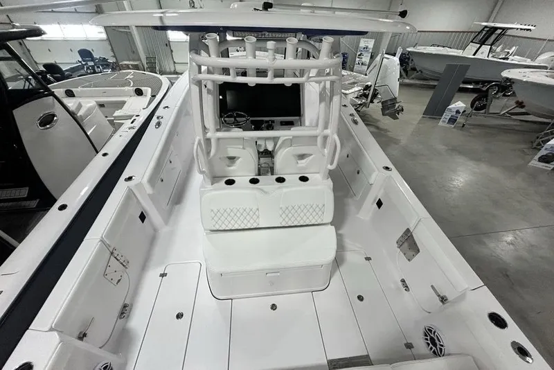 Slide: The Image of 2026 Sportsman Heritage 321 Center Console boat interior, showcasing sleek design and spacious layout. - 57