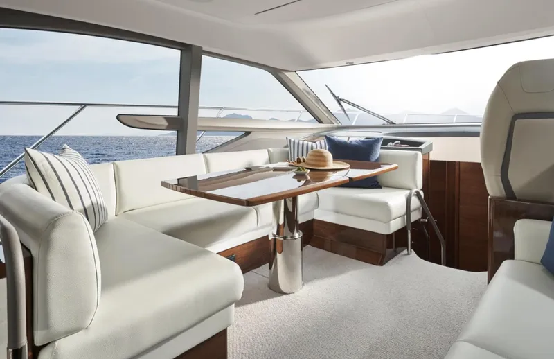 Slide: The Image of Luxurious interior of 2025 Princess F50 yacht with elegant seating and ocean view. - 19