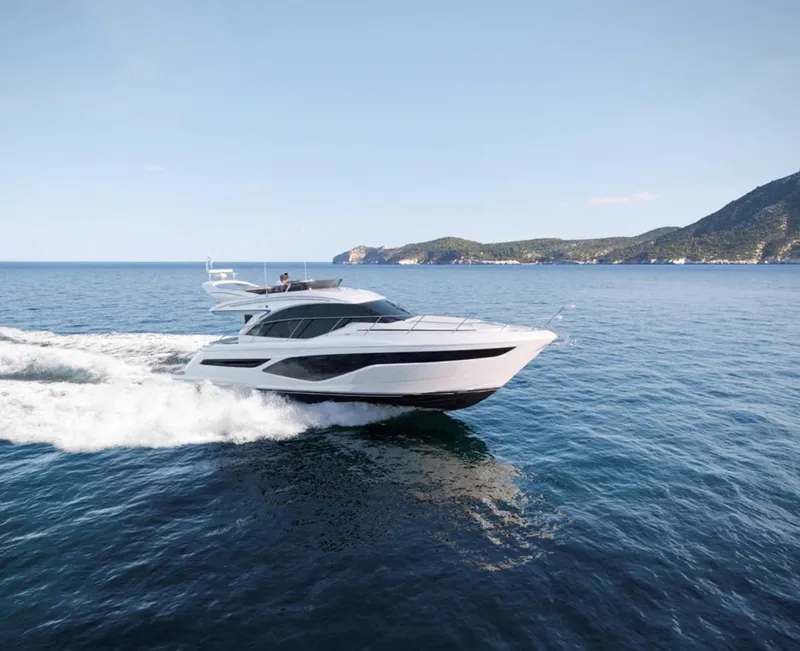 Slide: The Image of 2025 Princess F50 yacht cruising on open water. - 2