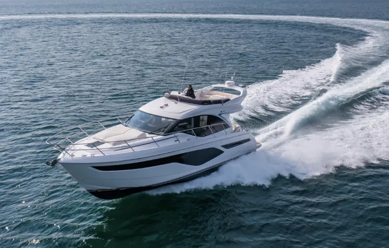 Slide: The Image of 2025 Princess F50 yacht cruising on open water. - 6