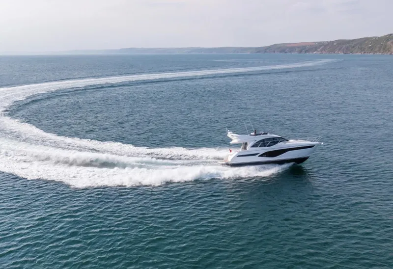 Slide: The Image of 2025 Princess F50 yacht cruising on open water. - 7