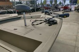 Slide: The Image of 2020 Grizzly 1754 SC boat with trolling motor in showroom. - 2