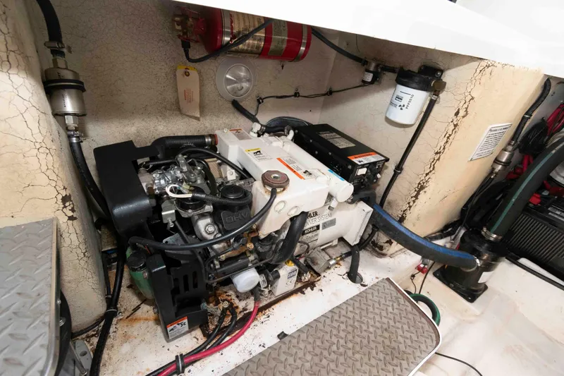 Slide: The Image of Engine compartment of a 2002 Formula 31 Performance Cruiser boat. - 13