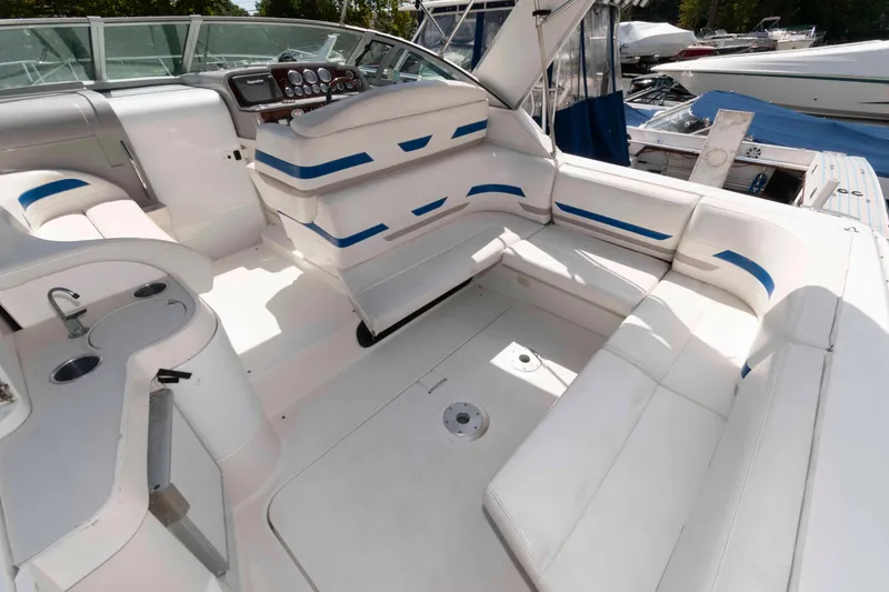 Slide: The Image of 2002 Formula 31 Performance Cruiser interior with white seating and cockpit view. - 2