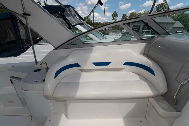 Slide: The Image of 2002 Formula 31 Performance Cruiser interior with white seating and blue accents. - 6