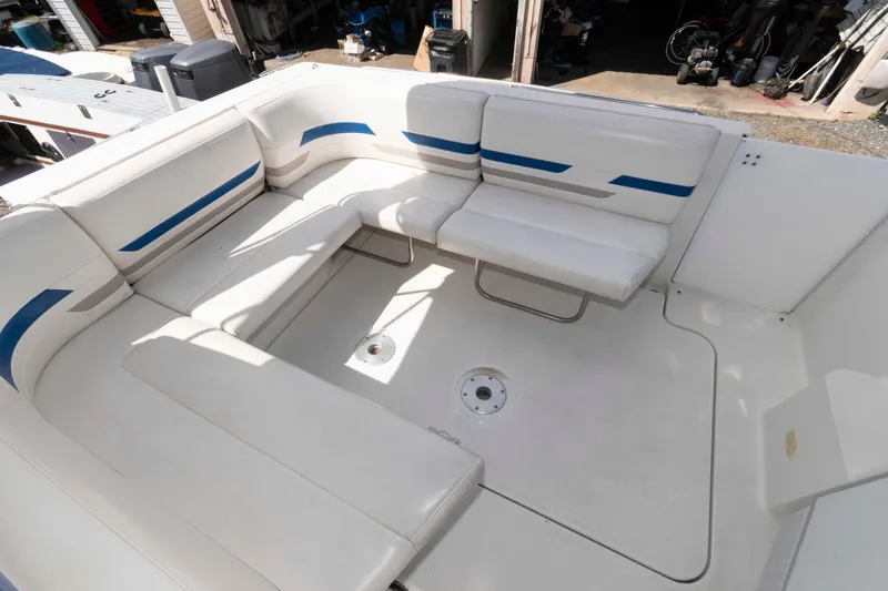 Slide: The Image of 2002 Formula 31 Performance Cruiser interior with white and blue seating arrangement. - 7