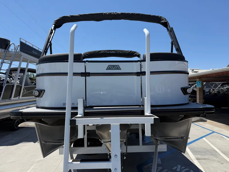 Slide: The Image of 2026 Avalon Catalina Platinum Quad Lounge boat on trailer. - 3