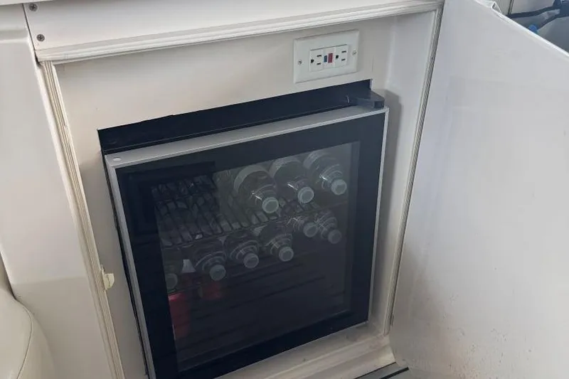 Slide: The Image of Mini fridge with glass door on Regal Commodore 3260 yacht, 2000 model. - 14