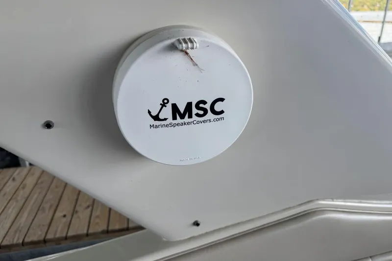 Slide: The Image of Marine speaker cover on a 2000 Regal Commodore 3260 boat, featuring MSC logo. - 16