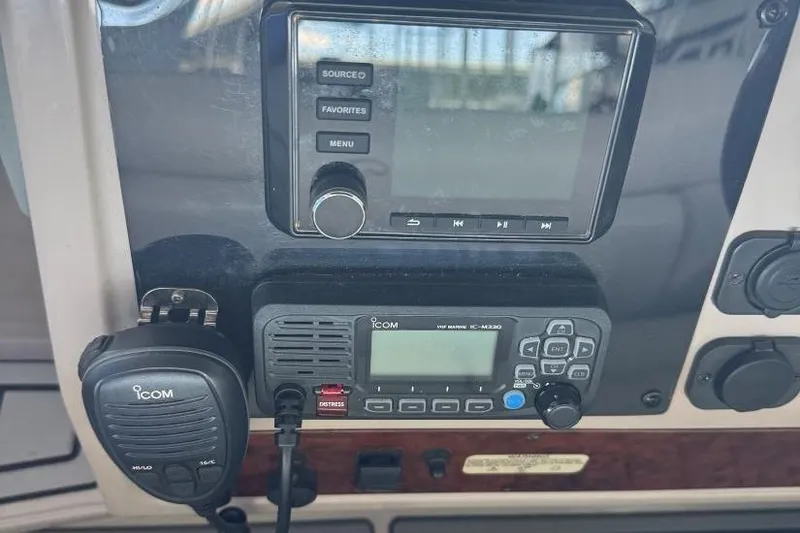 Slide: The Image of Control panel of a 2000 Regal Commodore 3260 boat with Icom radio equipment. - 20