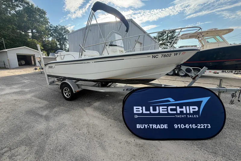 Slide: The Image of 2002 Boston Whaler 180 Dauntless boat on trailer at Bluechip Yacht Sales. - 10