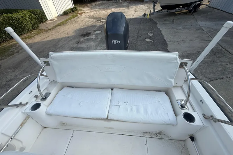 Slide: The Image of 2002 Boston Whaler 180 Dauntless boat interior with Yamaha 150 engine, white seating. - 13