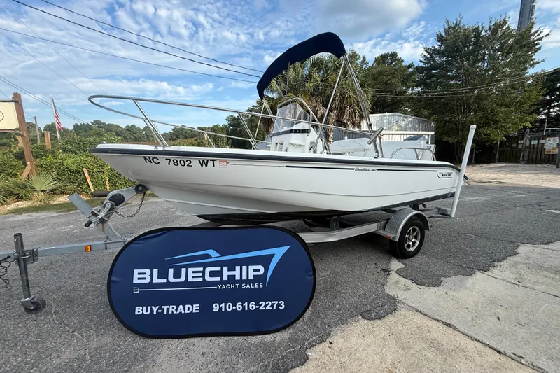 Slide: The Image of 2002 Boston Whaler 180 Dauntless boat on trailer at Bluechip Yacht Sales. - 20