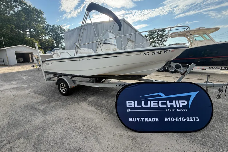 Slide: The Image of 2002 Boston Whaler 180 Dauntless boat on trailer at Bluechip Yacht Sales. - 21