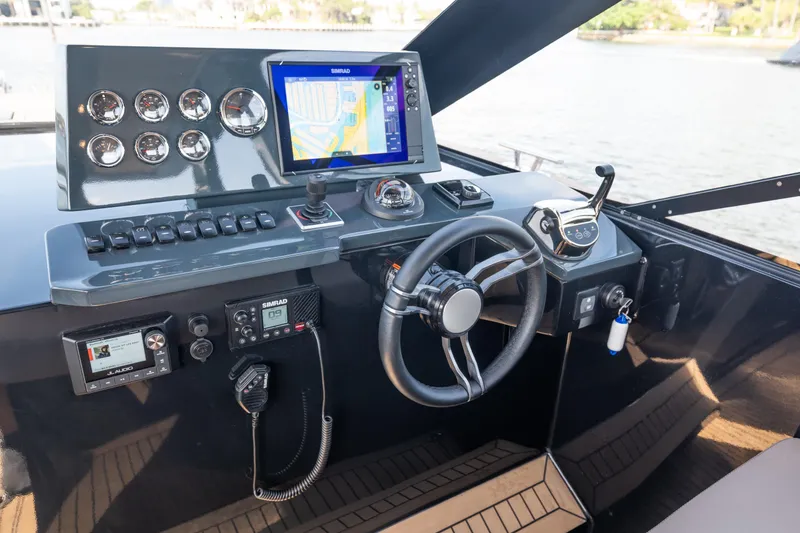 Slide: The Image of Helm of 2025 Colnago C38 OPEN yacht with navigation system and controls. - 16