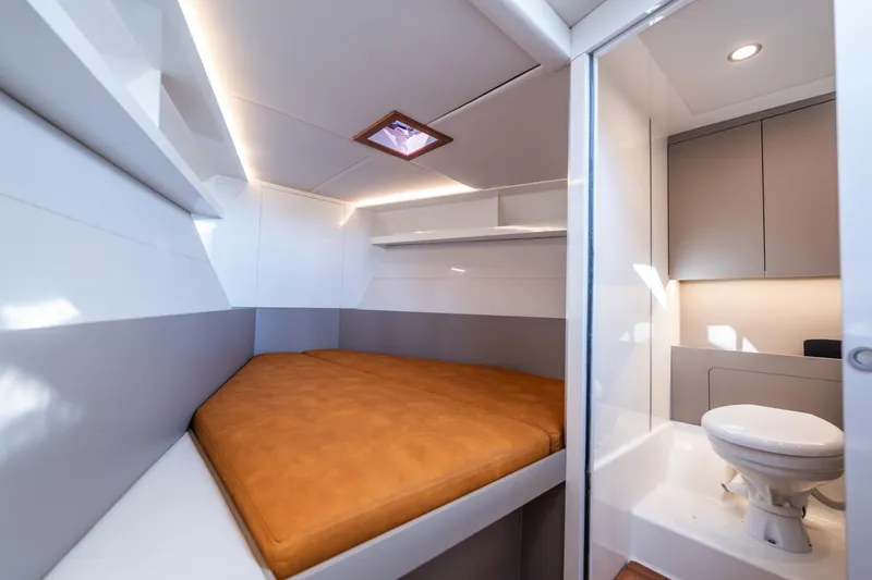 Slide: The Image of Modern interior of 2025 Colnago C38 OPEN yacht with cozy bed and compact bathroom. - 17