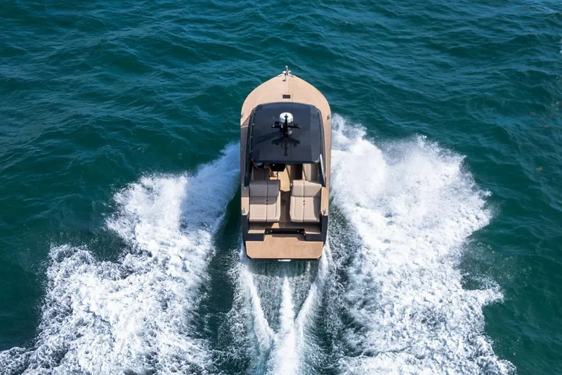 Slide: The Image of 2025 Colnago C38 OPEN boat cruising on blue ocean waters. - 6