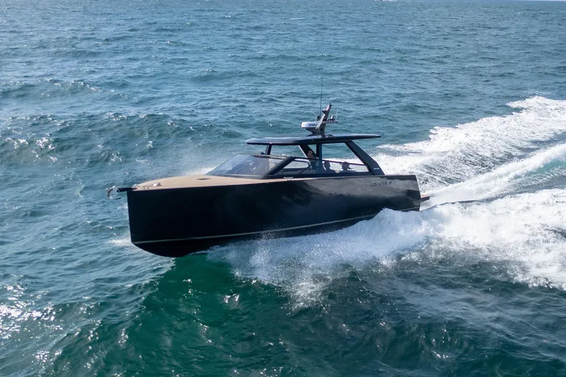 Slide: The Image of Sleek 2025 Colnago C38 OPEN yacht cruising on ocean waves. - 7