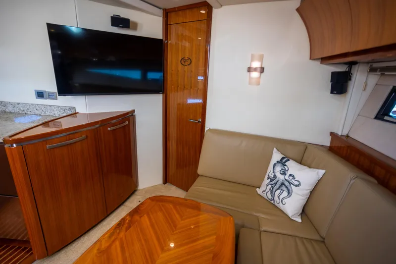 Slide: The Image of Luxurious interior of 2018 Cobalt 46 Yacht with elegant wood finishes and modern amenities. - 18