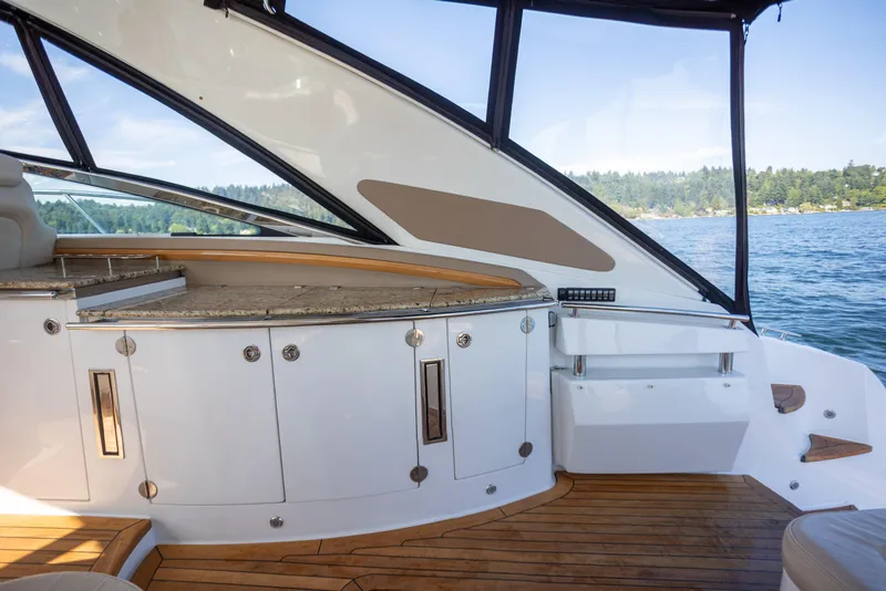 Slide: The Image of Luxurious interior of 2018 Cobalt 46 Yacht with elegant wood and granite finishes. - 8