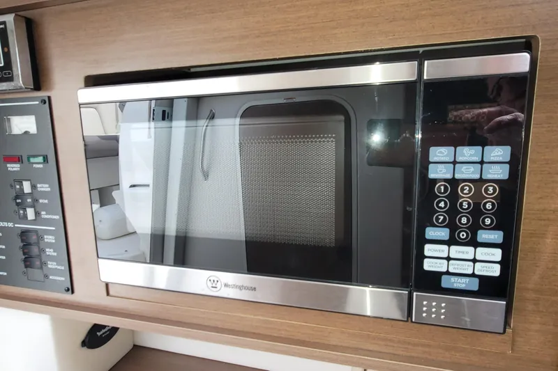 Slide: The Image of Westinghouse microwave in 2015 Sea Ray 260 Sundancer boat interior. - 22