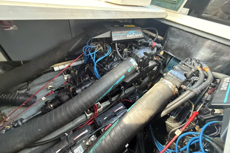 Slide: The Image of Engine compartment of a 1989 Sea Ray 300 Weekender with MerCruiser components. - 29