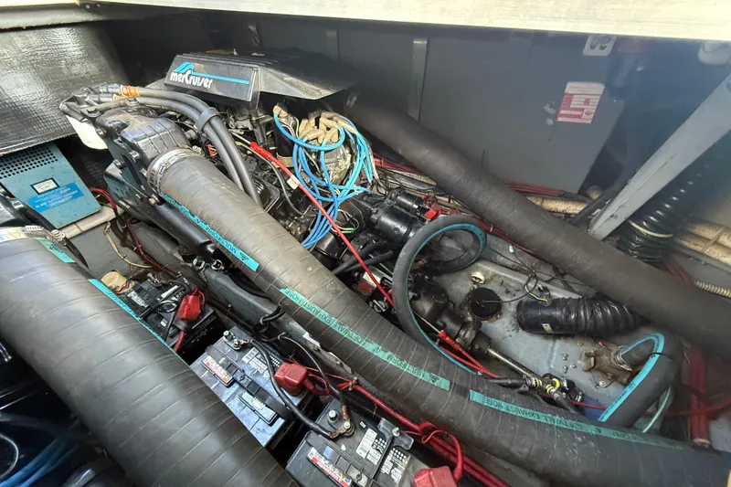 Slide: The Image of Engine compartment of a 1989 Sea Ray 300 Weekender with MerCruiser components. - 30