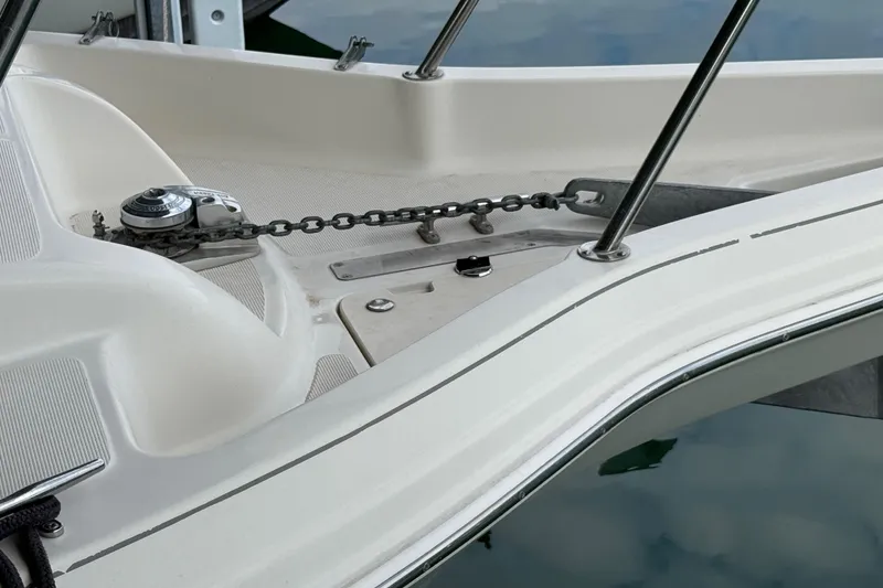 Slide: The Image of Bow of 2002 Regal Commodore 2860 with anchor chain and winch system. - 23