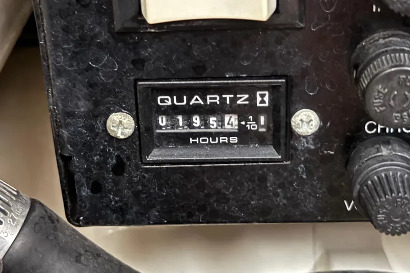 Slide: The Image of Hour meter reading 1954.1 on 2002 Regal Commodore 2860 boat dashboard. - 26