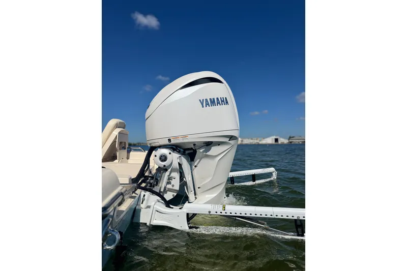 Slide: The Image of 2023 Grady-White 251 Coastal Explorer with Yamaha outboard engine on water. - 4