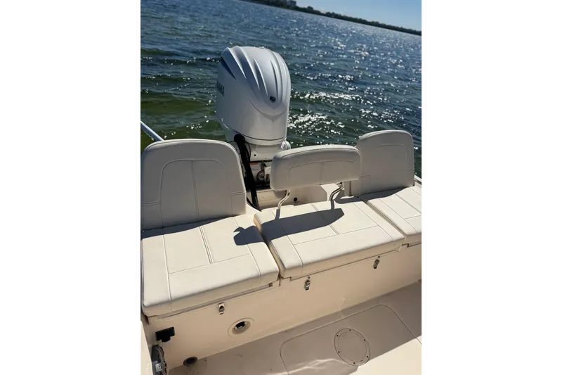 Slide: The Image of 2023 Grady-White 251 Coastal Explorer boat with Yamaha engine on a sunny day. - 9