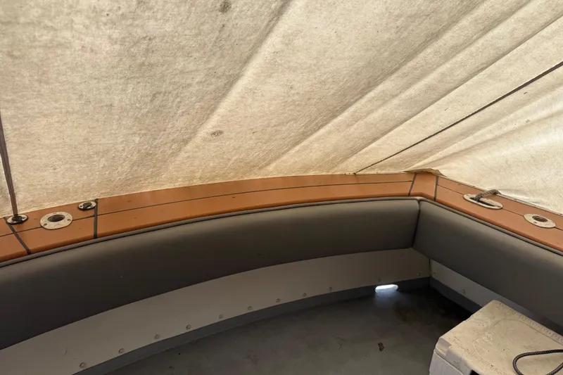 Slide: The Image of Interior view of 1974 Pacemaker 48 Sportfisherman boat with cushioned seating and wooden trim. - 20