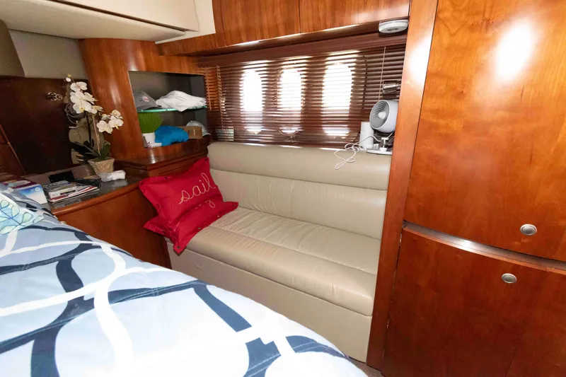 Slide: The Image of Luxurious interior of 2007 Cruisers Yachts 520 Express with cozy seating and elegant wood finish. - 15
