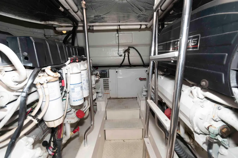 Slide: The Image of Engine room of 2007 Cruisers Yachts 520 Express with Volvo Penta engines and generator. - 19