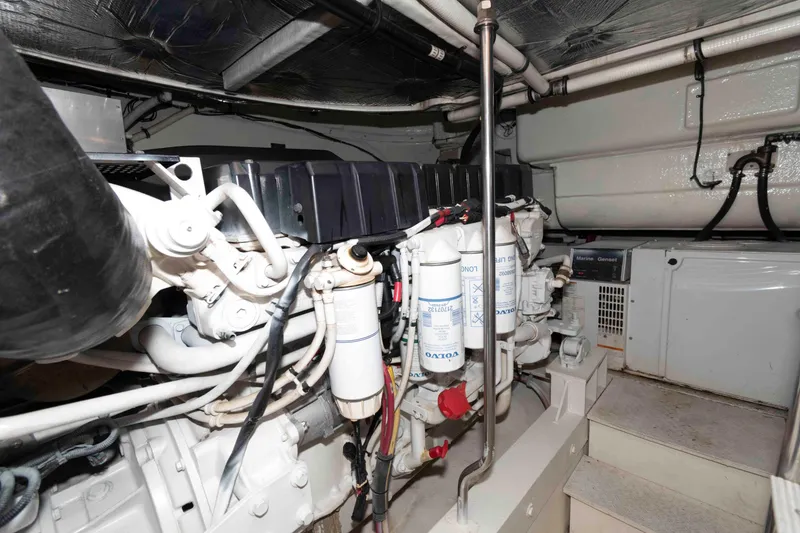 Slide: The Image of Engine room of 2007 Cruisers Yachts 520 Express, featuring Volvo components and generator. - 20
