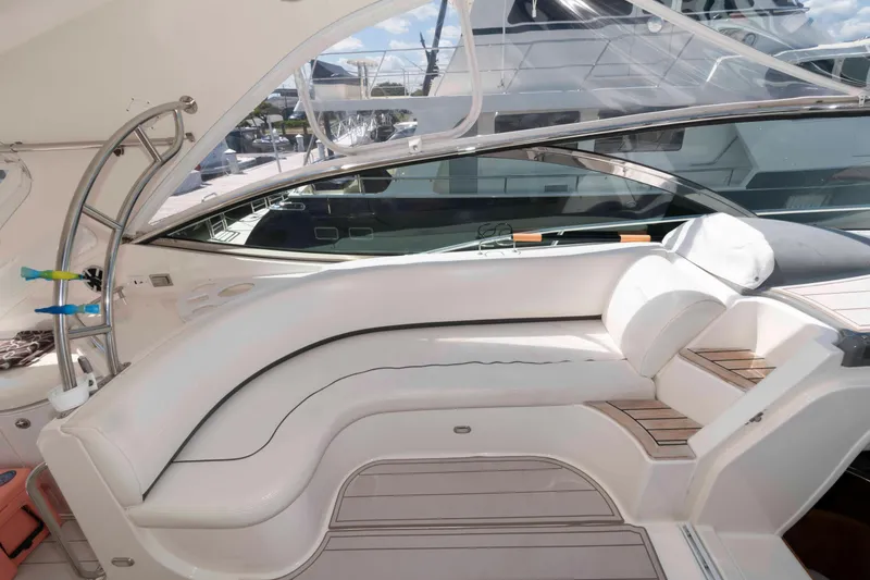 Slide: The Image of Luxurious 2007 Cruisers Yachts 520 Express interior with white seating and elegant design. - 4