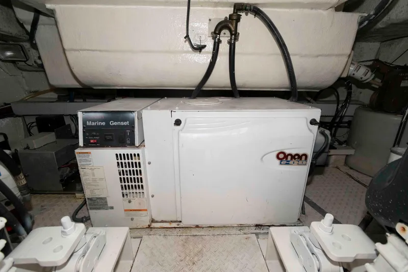 Slide: The Image of Engine room of 2007 Cruisers Yachts 520 Express with Onan marine generator. - 23
