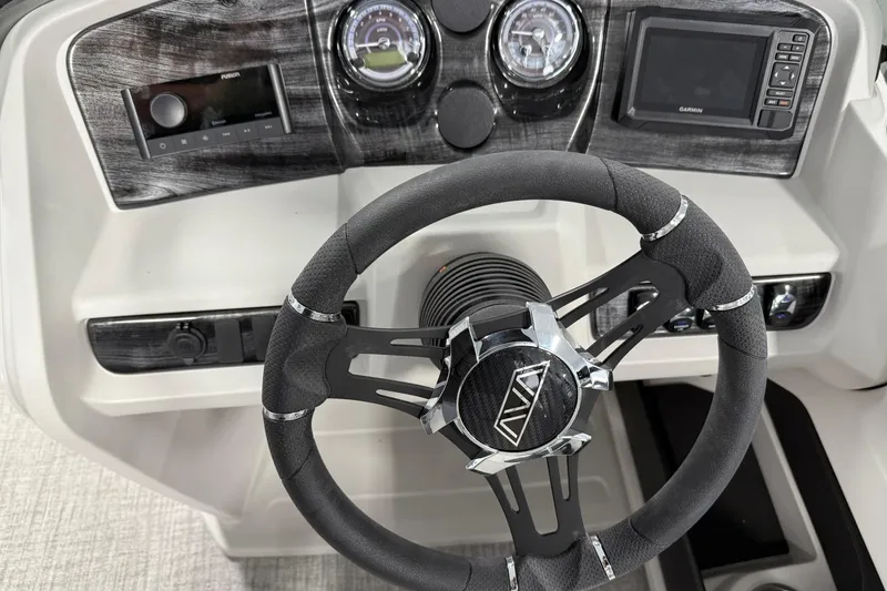 Slide: The Image of 2025 Avalon LSZ Cruise Rear Bench dashboard with steering wheel and modern controls. - 13