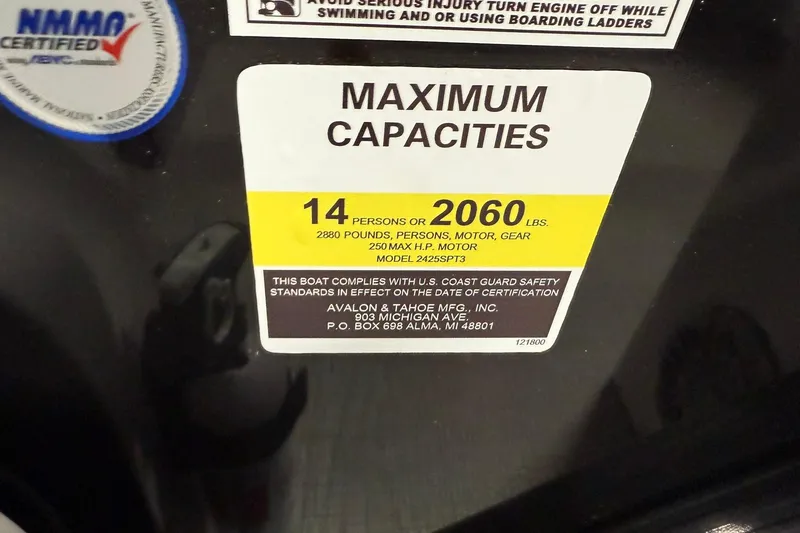 Slide: The Image of 2025 Avalon LSZ Cruise Rear Bench capacity label, 14 persons or 2060 lbs, USCG compliant. - 14