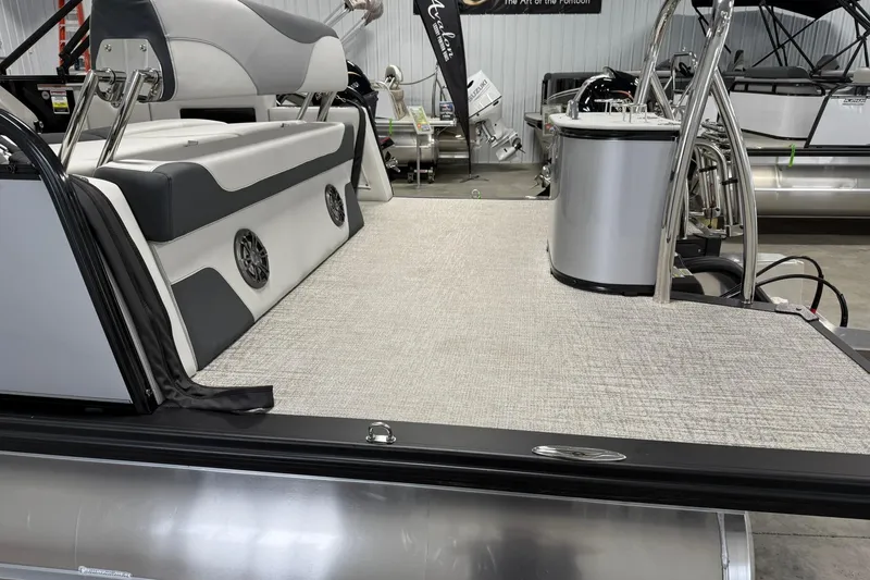 Slide: The Image of 2025 Avalon LSZ Cruise Rear Bench pontoon boat interior with sleek seating and modern design. - 7
