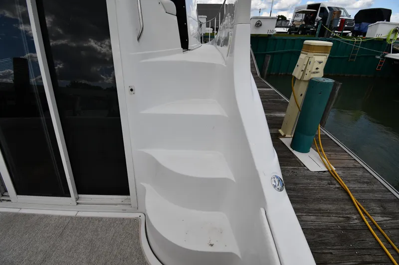 Slide: The Image of Staircase on 2001 Carver 350 Mariner yacht docked at marina. - 14
