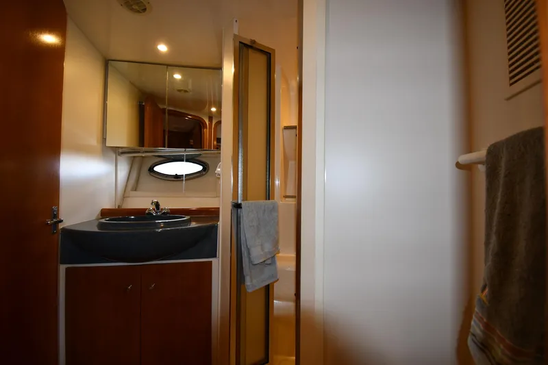 Slide: The Image of 2001 Carver 350 Mariner bathroom interior with sink, mirror, and shower. - 36