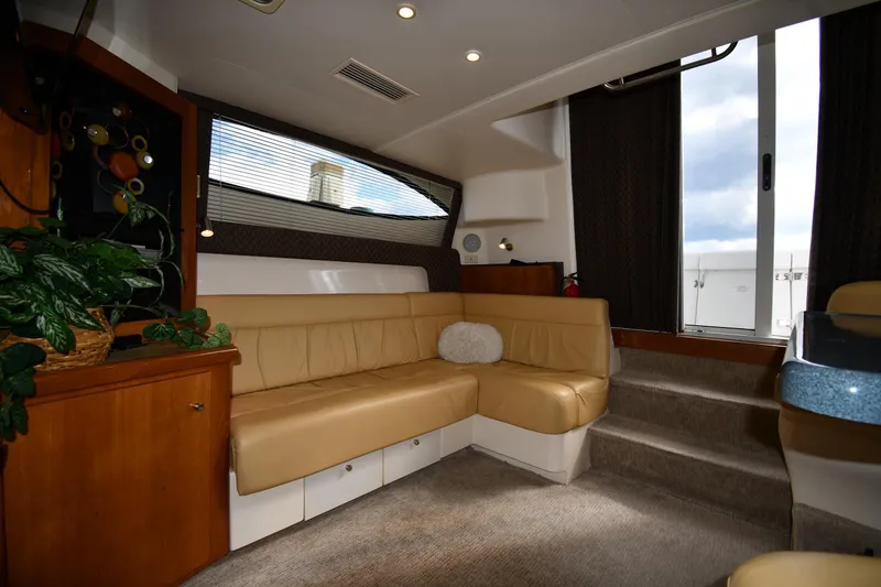 Slide: The Image of Interior of 2001 Carver 350 Mariner yacht with beige seating and modern decor. - 40