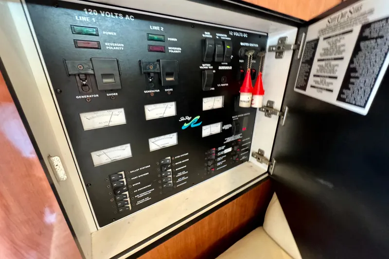 Slide: The Image of Electrical control panel of 2003 Sea Ray 400 Sedan Bridge yacht. - 39