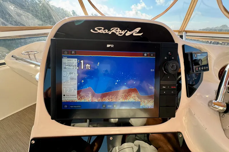 Slide: The Image of Dashboard of 2003 Sea Ray 400 Sedan Bridge with navigation display. - 50