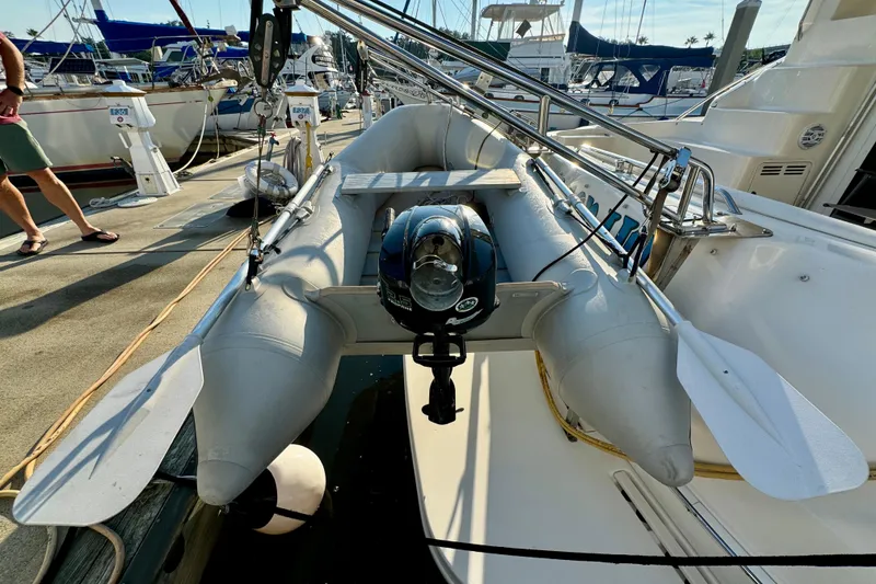 Slide: The Image of Inflatable dinghy on 2003 Sea Ray 400 Sedan Bridge yacht, docked at marina. - 57